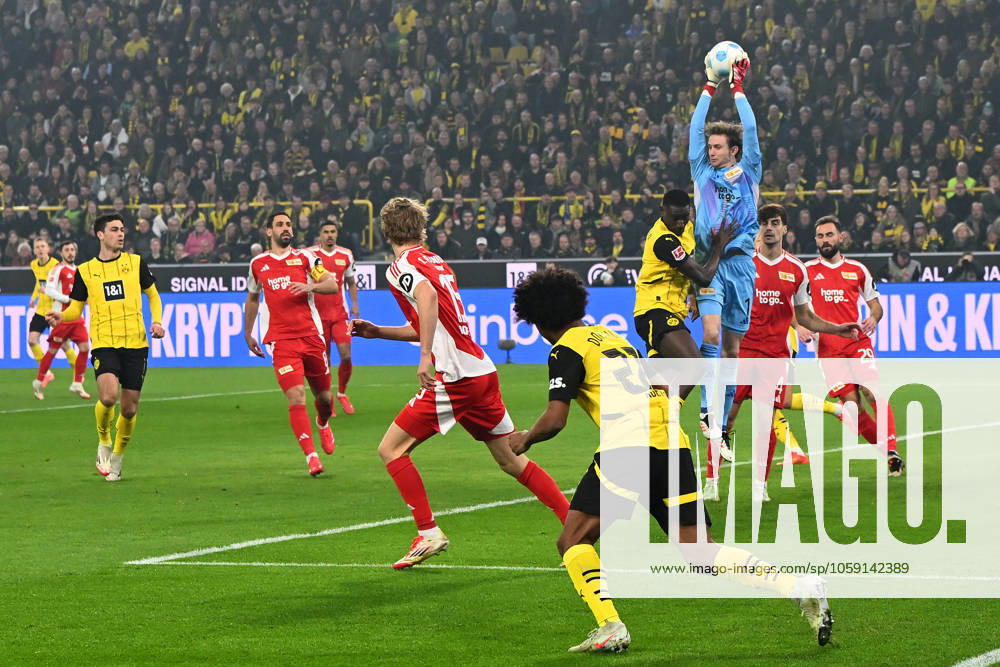 Serhou Guirassy Borussia Dortmund and goalkeeper Frederik Roennow Union Berlin battle for the ball during the Bundesliga match between Borussia Dortmund and 1 FC Union Berlin, SIGNAL IDUNA PARK on February 22, 2025 in Dortmund, Germany Photo by Ralf Treese DeFodi Images Serhou Guirassy Borussia Dortmund and goalkeeper Frederik Roennow Union Berlin battle for the ball during the Bundesliga match between Borussia Dortmund and 1 FC Union Berlin at Signal Iduna Park on February 22, 2025 in Dortmund, Germany Photo by Ralf Treese DeFodi Images DFL regulations prohibit any use of photographs as image sequences and or quasi video Photo by Ralf Treese DeFodi Images