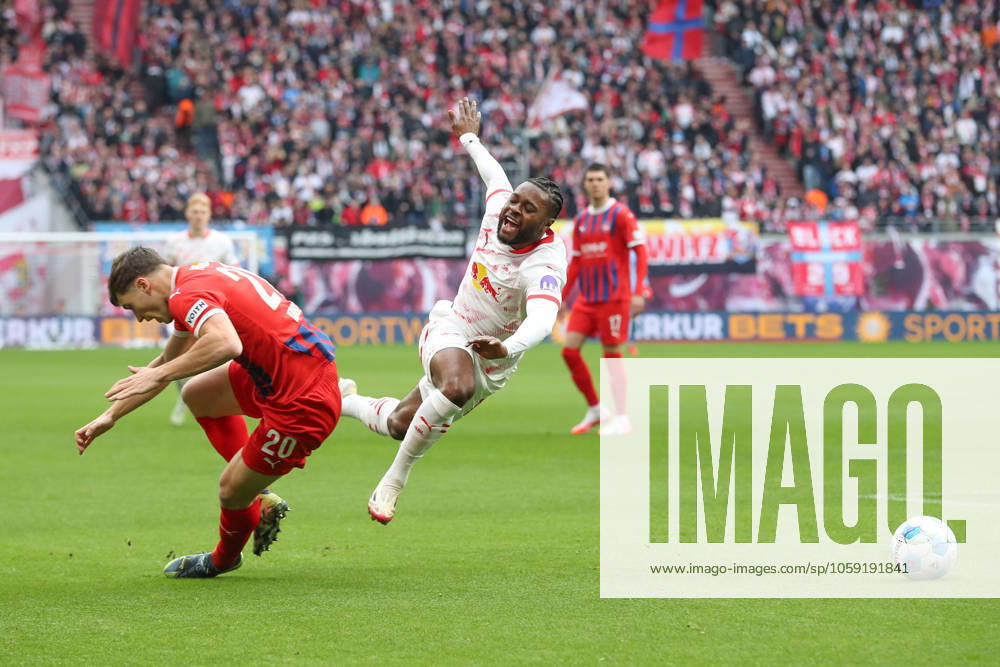 Football 1 Bundesliga, RB Leipzig 1 FC Heidenheim, v l Luca Kerber Heidenheim, 20 , Ridle Baku Leipzig duel, duel, fight, tackle Leipzig