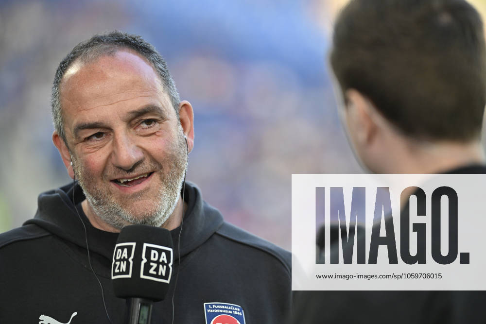 Before the match Coach Frank Schmidt 1 FC Heidenheim 1846 FCH Portrait in interview Microphone Micro Logo DAZN TSG 1899 Hoffenheim vs 1 FC Heidenheim 1846 FCH 09 03 2025 DFL REGULATIONS PROHIBIT ANY USE OF PHOTOGRAPHS AS IMAGE SEQUENCES AND OR QUASI VIDEO TSG 1899 Hoffenheim vs 1 FC Heidenheim 1846 FCH