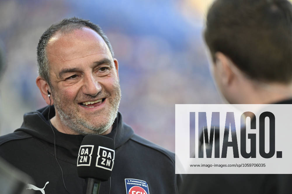 Before the match Coach Frank Schmidt 1 FC Heidenheim 1846 FCH Portrait in interview Microphone Micro Logo DAZN TSG 1899 Hoffenheim vs 1 FC Heidenheim 1846 FCH 09 03 2025 DFL REGULATIONS PROHIBIT ANY USE OF PHOTOGRAPHS AS IMAGE SEQUENCES AND OR QUASI VIDEO TSG 1899 Hoffenheim vs 1 FC Heidenheim 1846 FCH