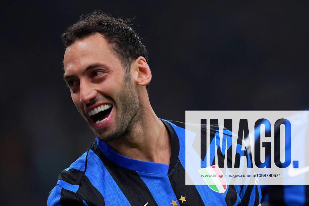 Inter Milan s Hakan Calhanoglu celebrates after scoring 2-0 during the Uefa Champions League soccer match between Inter and Feyenoord at the San Siro Stadium in Milan, north Italy - Tuesday , March 11 , 2025. - Soccer .