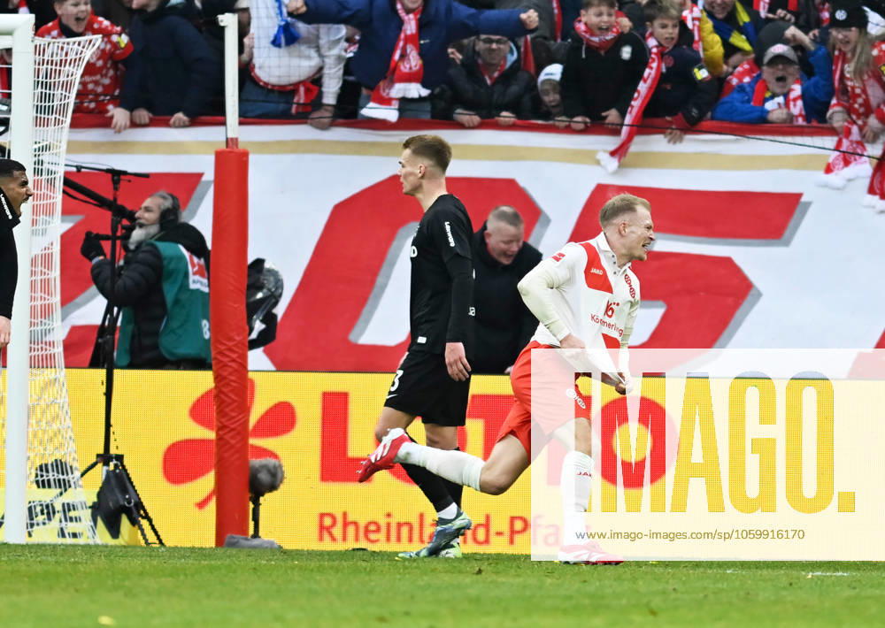Soccer Bundesliga Season 2024 2025 Mewa Arena Mainz 15 03 2025 1 FSV Mainz 05 mz FC Freiburg fr 2 2 Andreas HANCHE OLSEN 1 FSV Mainz 05 cheers after his goal for 2 1 DFL REGULATIONS PROHIBIT ANY USE OF PHOTOGRAPHS AS IMAGE SEQUENCES AND OR QUASI VIDEO NATIONAL AND INTERNATIONAL NEWS AGENCIES OUT Soccer Bundesliga 1 FSV Mainz 05