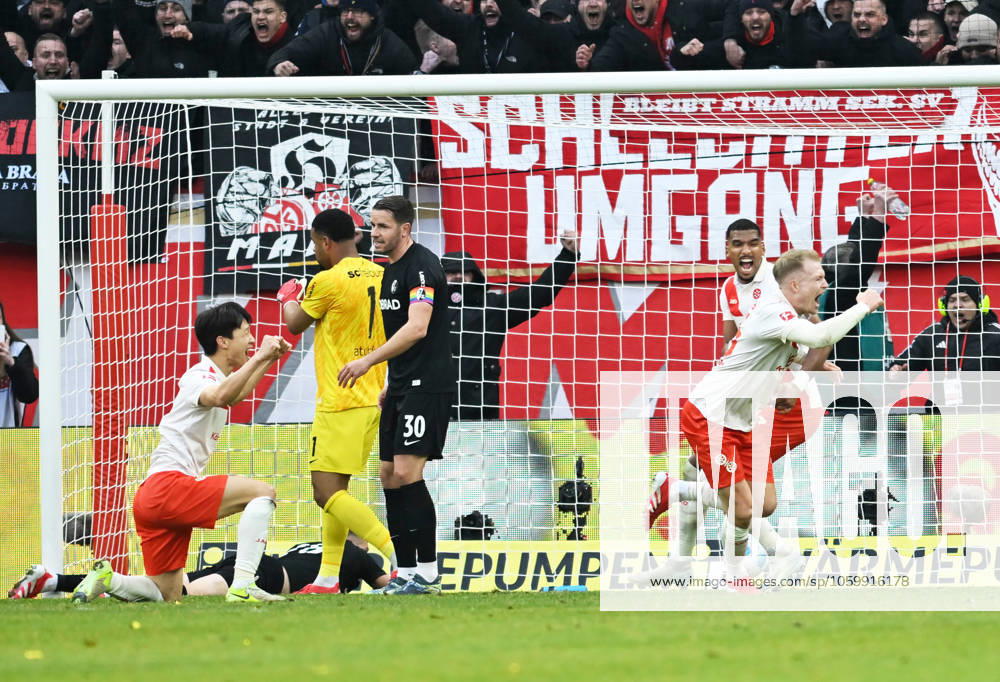 Soccer Bundesliga Season 2024 2025 Mewa Arena Mainz 15 03 2025 1 FSV Mainz 05 mz FC Freiburg fr 2 2 Andreas HANCHE OLSEN 1 FSV Mainz 05 cheers after his goal for 2 1 DFL REGULATIONS PROHIBIT ANY USE OF PHOTOGRAPHS AS IMAGE SEQUENCES AND OR QUASI VIDEO NATIONAL AND INTERNATIONAL NEWS AGENCIES OUT Soccer Bundesliga 1 FSV Mainz 05