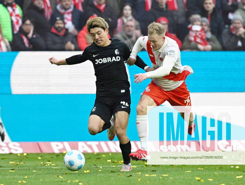 Soccer Bundesliga Season 2024 2025 Mewa Arena Mainz 15 03 2025 1 FSV Mainz 05 mz FC Freiburg fr 2 2 Ritsu DOAN SC Freiburg , li Andreas HANCHE OLSEN 1 FSV Mainz 05 DFL REGULATIONS PROHIBIT ANY USE OF PHOTOGRAPHS AS IMAGE SEQUENCES AND OR QUASI VIDEO NATIONAL AND INTERNATIONAL NEWS AGENCIES OUT Soccer Bundesliga 1 FSV Mainz 05