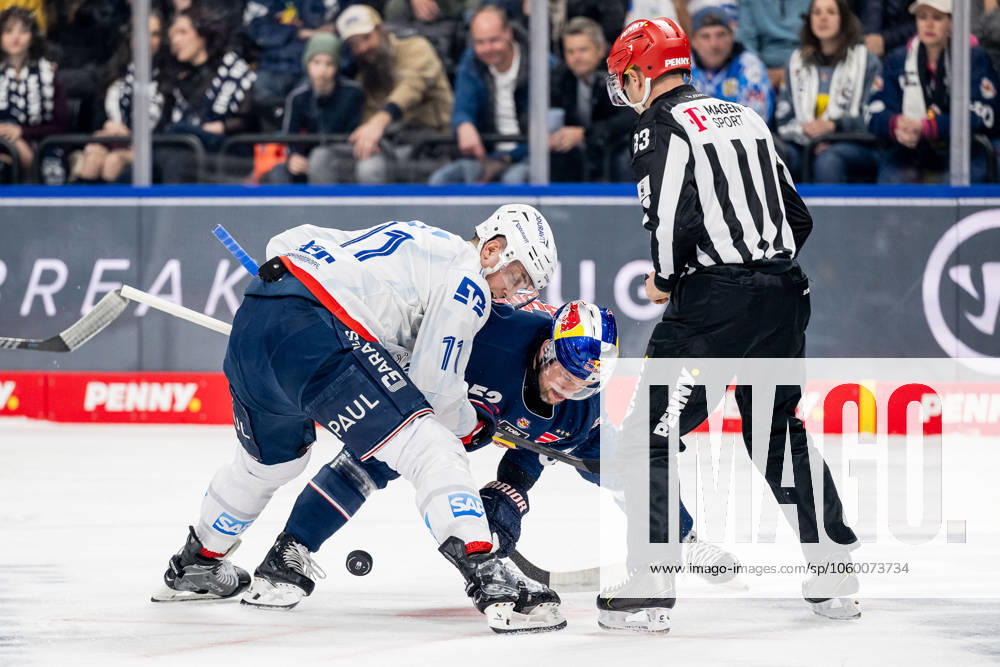 Linesperson David Tschirner executes a faceoff between Patrick Hager EHC Red Bull Muenchen, 52 and Kristian Reichel Adler Mannheim, 11 GER, EHC Red Bull Muenchen vs Adler Mannheim, Ice Hockey, DEL, Playoffs, Quarterfinals Game 2, 2024 2025 Season, 19 03 2025 GER, EHC Red Bull Muenchen vs Adler Mannheim, Ice Hockey, DEL, Playoffs, Quarterfinals Game 2, 2024 2025 Season, 19 03 2025 Muenchen