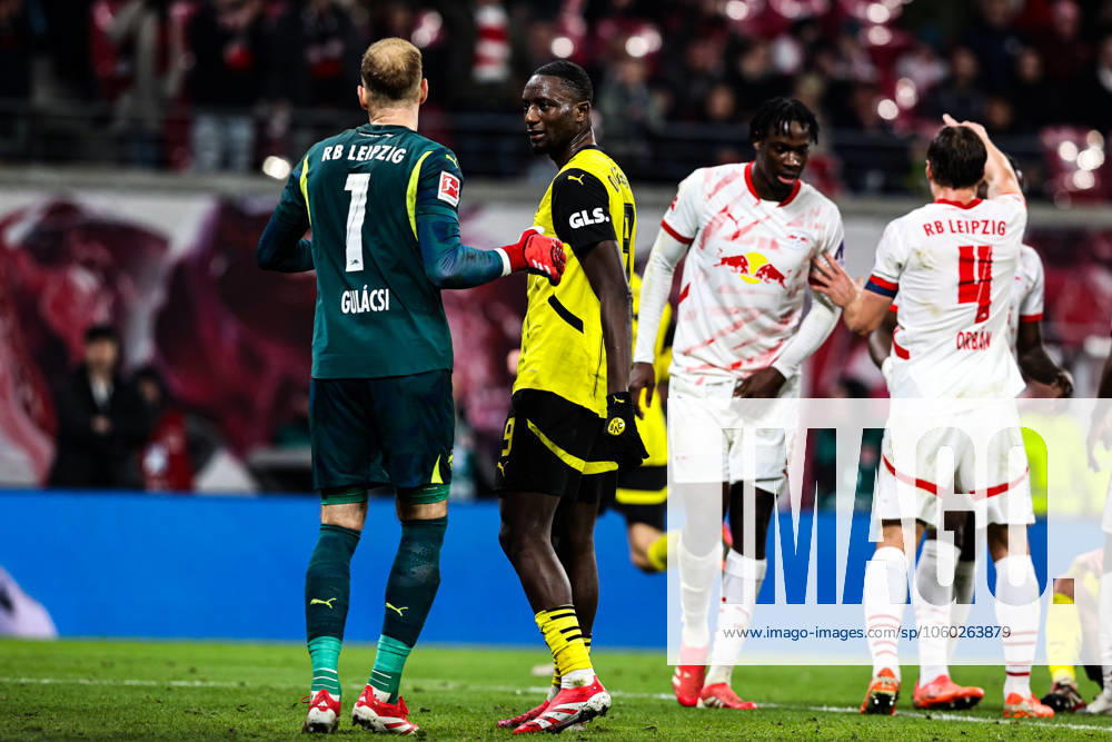 Serhou Guirassy Borussia Dortmund,9 and goalkeeper Peter Gulacsi RB Leipzig,1 1 Soccer Bundesliga Season 2024 2025 RB Leipzig vs Borussia Dortmund at the Red Bull Arena in Leipzig Action,Soccer,Germany,Man,Men