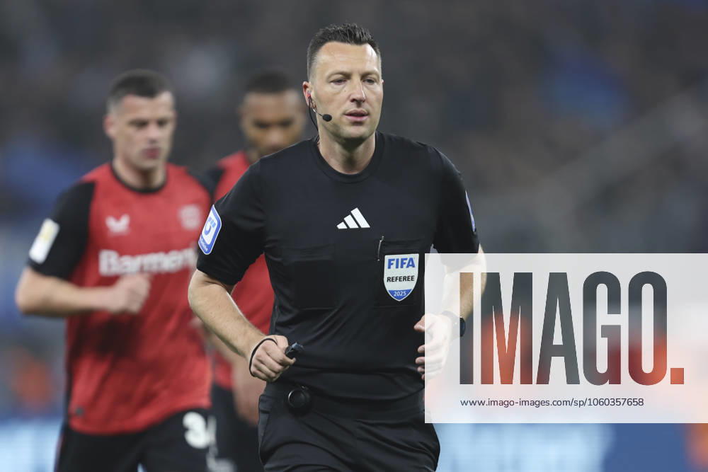 Referee Sven Jablonski looks on during the Bundesliga match between Bayer 04 Leverkusen and VfL Bochum 1848, BayArena on March 28, 2025 in Leverkusen, Germany Photo by Oliver Kaelke DeFodi Images Referee Sven Jablonski looks on during the Bundesliga match between Bayer 04 Leverkusen and VfL Bochum 1848 at BayArena on March 28, 2025 in Leverkusen, Germany Photo by Oliver Kaelke DeFodi Images DFL regulations prohibit any use of photographs as image sequences and or quasi video Photo by Oliver Kaelke DeFodi Images
