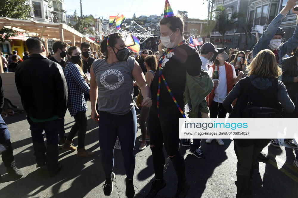 San Francisco, California - Hundreds of San Franciscans held an impromptu street party in the Castro District Saturday after news agencies called the US presidential election for Joe Biden. San Francisco USA - ZUMAw332 20201107_zap_w332_011