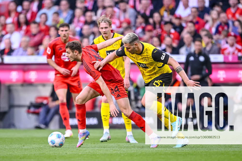 Josip Stanisic FC Bayern Muenchen and Niklas Suele BV Borussia Dortmund in a duel during the Bundesliga match between FC Bayern München and Borussia Dortmund, Allianz Arena on April 12, 2025 in Munich, Germany Photo by Harry Langer DeFodi Images Josip Stanisic FC Bayern Muenchen and Niklas Suele BV Borussia Dortmund battle for the ball during the Bundesliga match between FC Bayern München and Borussia Dortmund at Allianz Arena on April 12, 2025 in Munich, Germany Photo by Harry Langer DeFodi Images DFL regulations prohibit any use of photographs as image sequences and or quasi video Photo by Harry Langer DeFodi Images DFL regulations prohibit any use of photographs as image sequences and or quasi video