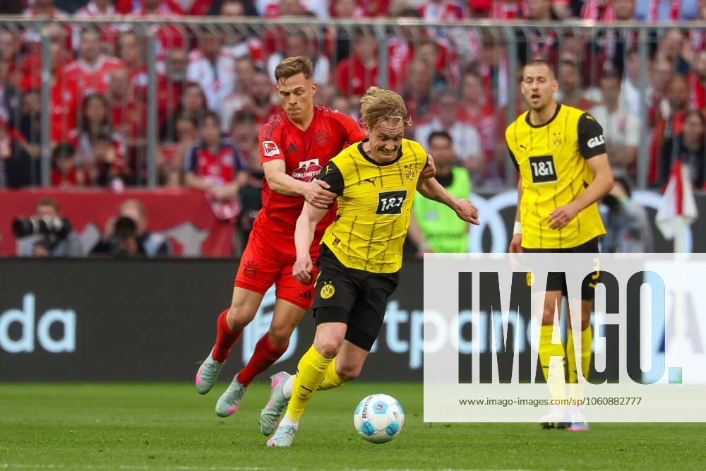 In duel, action, with Joshua Kimmich 6 FC Bayern Muenchen , Julian Brandt 10 Borussia Dortmund , FC Bayern Muenchen vs Borussia Dortmund, Football, 1 Bundesliga, 29 Matchday, 12 04 2025 DFB regulations prohibit any use of photographs as image sequences and or quasi video Muenchen Bayern Germany