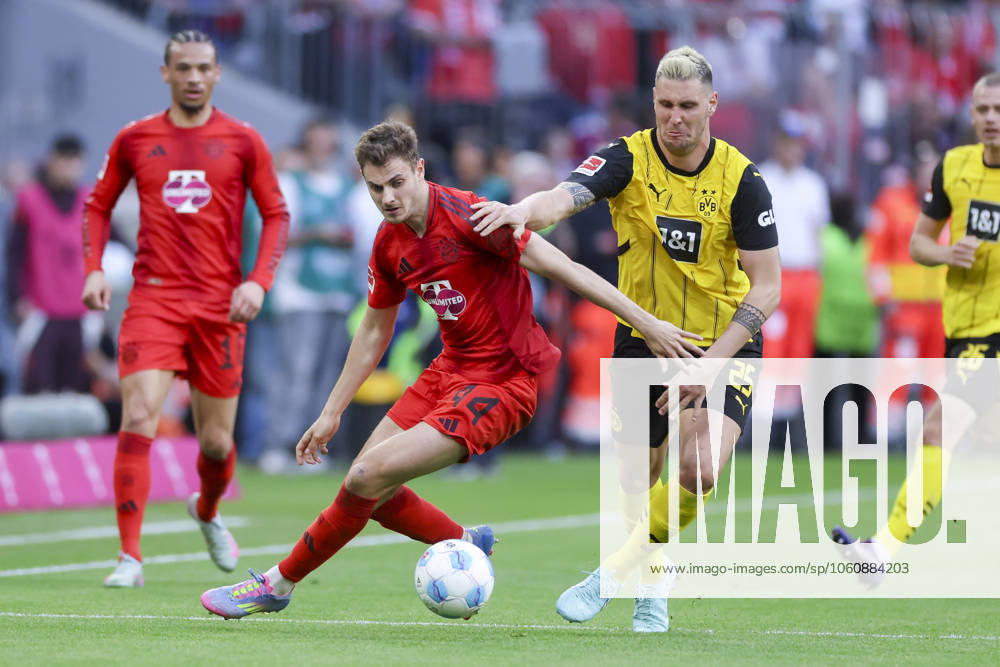 Josip Stanisic FC Bayern Muenchen and Niklas Suele Borussia Dortmund battle for the ball, Bundesliga, FC Bayern München v Borussia Dortmund, Allianz Arena, April 12, 2025 in Munich, Germany Photo by Marco Steinbrenner DeFodi Images Josip Stanisic FC Bayern Muenchen and Niklas Suele Borussia Dortmund battle for the ball, Bundesliga, FC Bayern München v Borussia Dortmund, Allianz Arena, April 12, 2025 in Munich, Germany Photo by Marco Steinbrenner DeFodi Images DFL regulations prohibit any use of photographs as image sequences and or quasi video