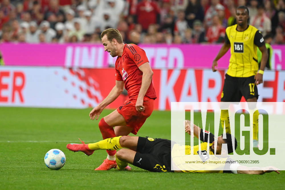 Harry KANE Bayern Muenchen , Action,duel against Emre CAN Borussia Dortmund Football 1 Bundesliga Season 2024 2025, 29 Matchday, Matchday29 FC Bayern Muenchen Borussia Dortmund 2 2 on 12 04 2025 , A L L I A N Z A R E N A