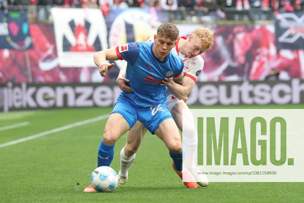 Football 1 Bundesliga, RB Leipzig Holstein Kiel, v l Nicolai Remberg Kiel, 22 , Nicolas Seiwald Leipzig, 13 duel, duel, fight, tackle Leipzig