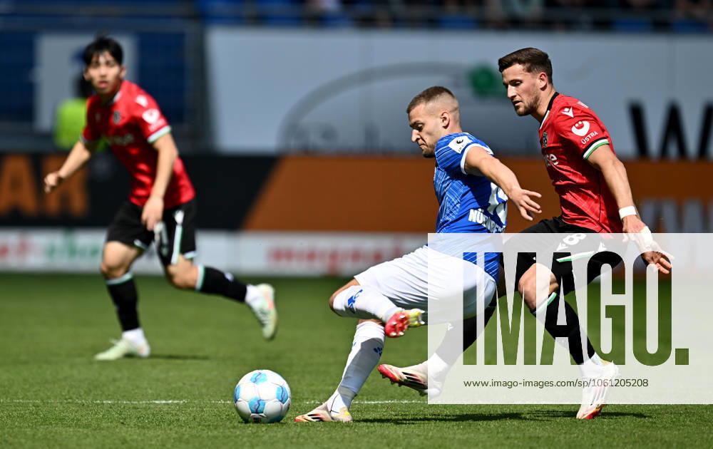 Fussball 2 Bundesliga, SV Darmstadt 98 Hannover 96 v l Fabian Nürnberger Nuernberger SV Darmstadt 98 , Enzo Leopold Hannover 96 Licensing of this image to and or by SV Darmstadt 1898 e V and subsidiaries is not permitted No release of or sale to SV Darmstadt 1898 e V Darmstadt