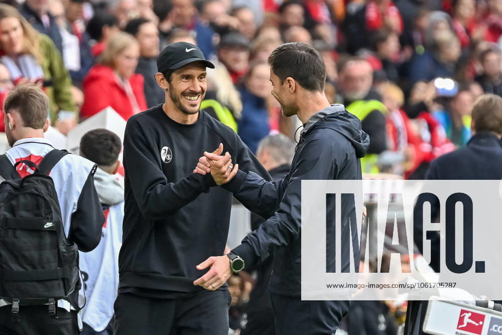 Julian Schuster SC Freiburg, Coach and Xabi Alonso Bayer 04 Leverkusen, Head Coach greet each other before the match GER, SC Freiburg Bayer 04 Leverkusen, Football, Bundesliga, Matchday 32, Season 2024 2025, 04 05 2025 DFL DFB REGULATIONS PROHIBIT ANY USE OF PHOTOGRAPHS AS IMAGE SEQUENCES AND OR QUASI VIDEO GER, SC Freiburg Bayer 04 Leverkusen, Football, Bundesliga, Matchday 32, Season 2024 2025, 04 05 2025 Freiburg