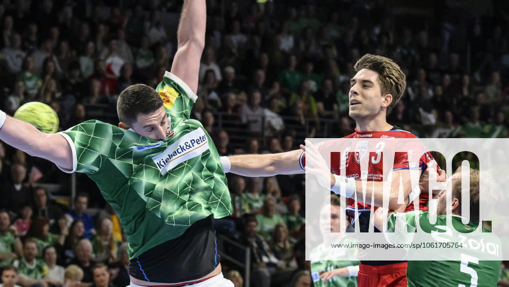 In the picture from l Mijajlo Marsenic Fuechse Berlin, 93 , Nikola Vlahovic SG BBM Bietigheim, 03 , duel, action, fight, fights for the ball, GER, Berlin, Handball, Fuechse Berlin vs SG BBM Bietigheim, DAIKIN Handball Bundesliga, in the Max Schmeling Halle, 04 05 2025,