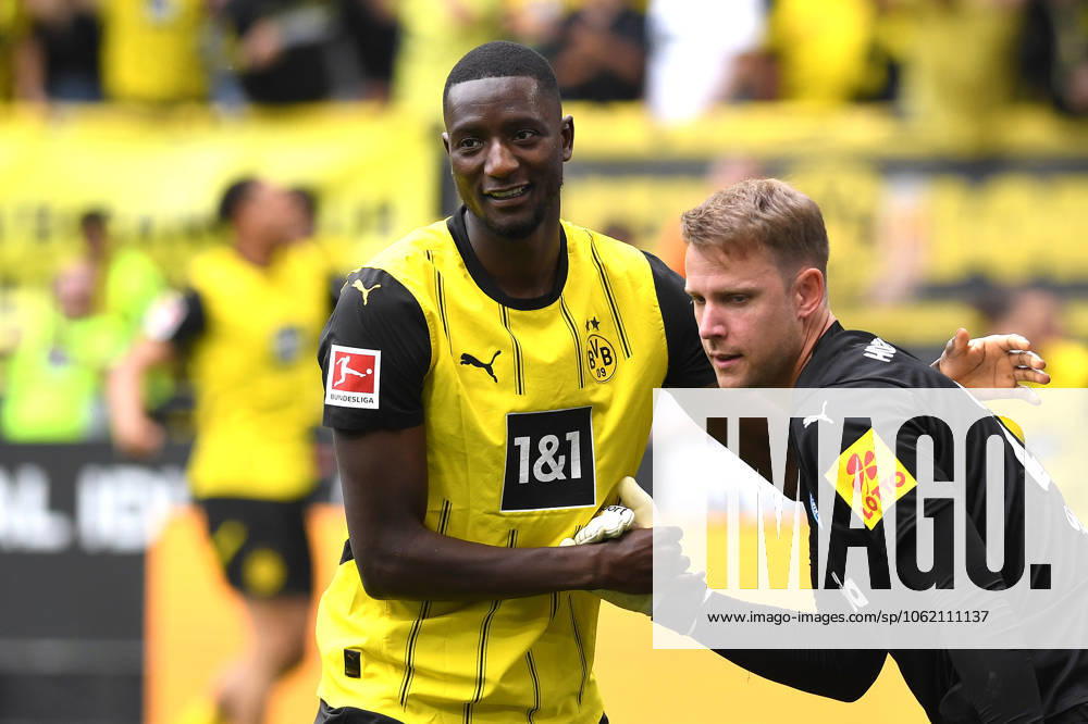 Serhou Guirassy Borussia Dortmund and goalkeeper Thomas Daehne Holstein Kiel gestures during the Bundesliga 1 match between Borussia Dortmund and Holstein Kiel, SIGNAL IDUNA PARK on May 17, 2025 in Dortmund, Germany, Germany Photo by Ralf Treese521 DeFodi Images Serhou Guirassy Borussia Dortmund and goalkeeper Thomas Daehne Holstein Kiel gestures during the Bundesliga match between Borussia Dortmund and Holstein Kiel at Signal Iduna Park on May 17, 2025 in Dortmund, Germany Photo by Ralf Treese521 DeFodi Images DFL regulations prohibit any use of photographs as image sequences and or quasi video Photo by Ralf Treese521 DeFodi Images