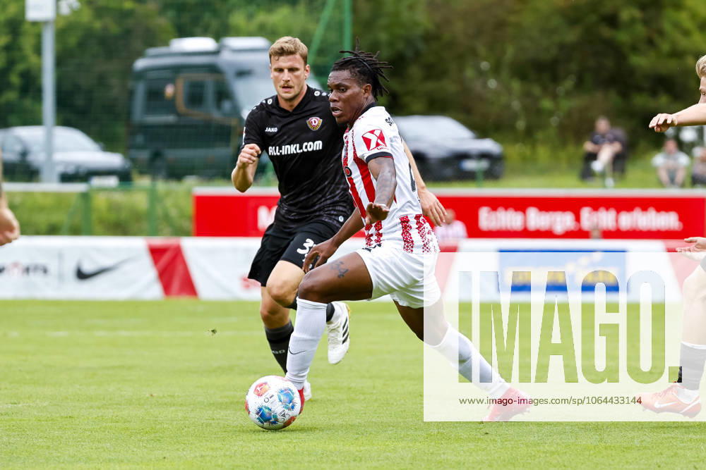 Christoph Daferner SG Dynamo Dresden, 33 and Cyriaque Irie SC Freiburg, 22 in a running duel , Football, Test match, 2025 2026, SC Freiburg vs SG Dynamo Dresden, 25 07 2025, Football ground Schruns, Schruns, Austria Schruns Football ground Schruns Vorarlberg Austria