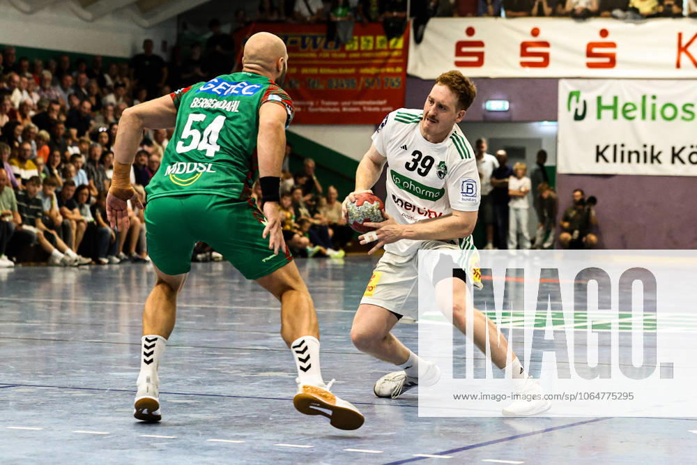Lukas Stutzke TSV Hannover Burgdorf,39 vs Oscar Bergendahl SC Magdeburg,54 1 Handball Bundesliga Season 2025 2026 Test match HG 85 Köthen vs SC Magdeburg in the Heinz Fricke Sports Hall in Köthen Action,Handball,Man,Men,Germany