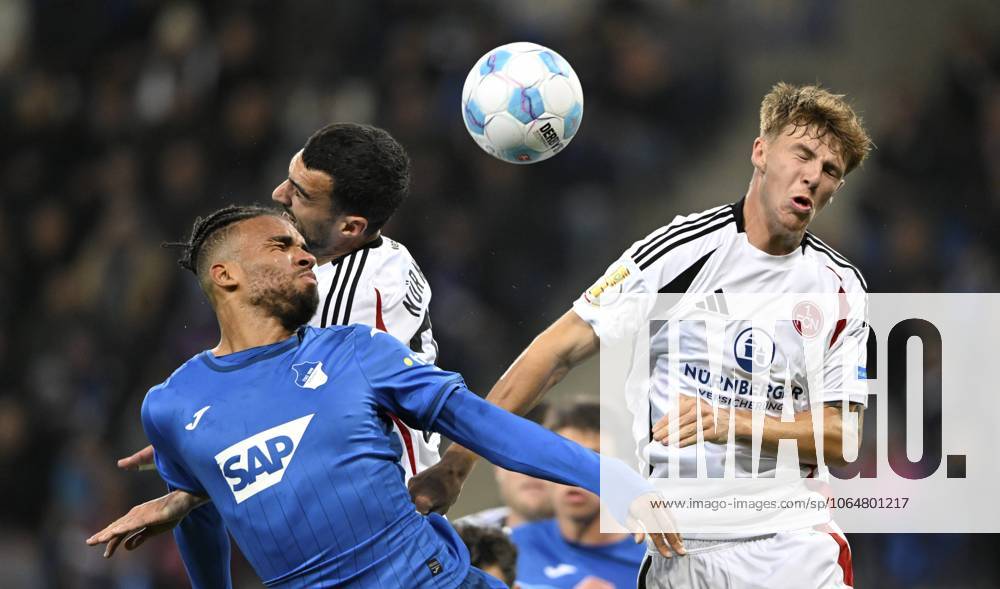 Strafraumszene, Torraumszene, Kopfballduell Zweikampf Aktion Kevin Akpoguma TSG 1899 Hoffenheim 25 gegen Mahir Emreli 1. FC Nürnberg FCN 30 Finn Jeltsch 1. FC Nürnberg FCN 04 DFB-Pokal, PreZero Arena, Sinsheim, Baden-Württemberg, Deutschland, Europa Penalty area scene, goal area scene, header duel, duel action Kevin Akpoguma TSG 1899 Hoffenheim 25 against Mahir Emreli 1. FC Nürnberg FCN 30 Finn Jeltsch 1. FC Nürnberg FCN 04 DFB-Pokal, PreZero Arena, Sinsheim, Baden-Württemberg, Germany, Europe