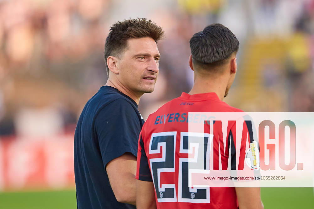 Vincent Wagner SV 07 Elversberg, head coach after the match in conversation with Younes Ebnoutalib SV 07 Elversberg, 22 GER, SSV 1846 Ulm vs SV 07 Elversberg, Football, Mens DFB Cup, 1 round, Season 2025 2026, 17 08 2025 DFB regulations prohibit any use of photographs as image sequences and or quasi video GER, SSV 1846 Ulm vs SV 07 Elversberg, Football, Mens DFB Cup, 1 round, Season 2025 2026, 17 08 2025 Ulm