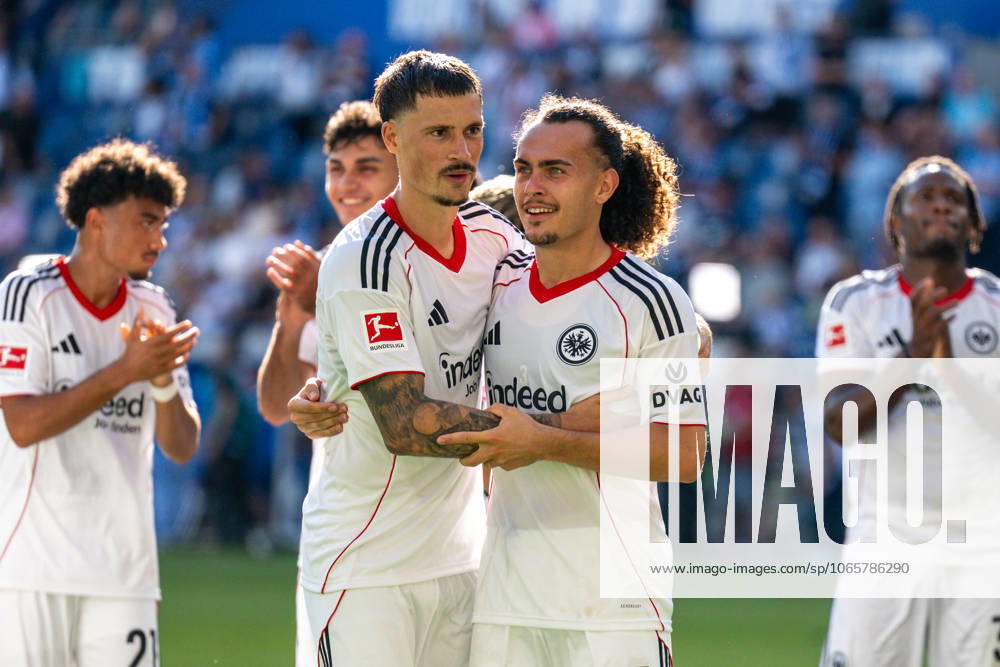 Robin Koch Eintracht Frankfurt, 04 and Aurele Amenda Eintracht Frankfurt, 05 hug after the match and celebrate the win, GER, TSG 1899 Hoffenheim vs Eintracht Frankfurt, Football, 1 Bundesliga, Matchday 2 Season 2025 2026, 30 08 2025 DFL REGULATES PROHIBIT ANY USE OF PHOTOGRAPHS AS IMAGE SEQUENCES AND OR QUASI VIDEO GER, TSG 1899 Hoffenheim vs Eintracht Frankfurt, Football, 1 Bundesliga, Matchday 2 Season 2025 2026, 30 08 2025 Sinsheim
