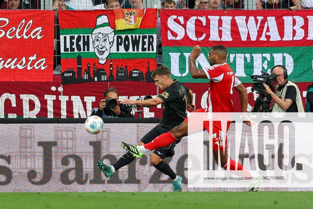 In duel, action, with Robin Fellhauer 19 FC Augsburg , Jonathan Tah 4 FC Bayern Muenchen , FC Augsburg vs FC Bayern Muenchen, Soccer, 1 Bundesliga, 2 Matchday, 30 08 2025 DFB regulations prohibit any use of photographs as image sequences and or quasi video Augsburg Bayern Germany