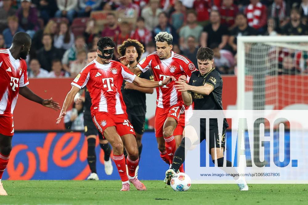 In duel, action, with Alexandar Pavlovic 45 FC Bayern Muenchen , Luis Diaz 14 FC Bayern Muenchen , Mert Koemuer 36 FC Augsburg , FC Augsburg vs FC Bayern Muenchen, Football, 1 Bundesliga, 2 Matchday, 30 08 2025 DFB regulations prohibit any use of photographs as image sequences and or quasi video Augsburg Bayern Germany