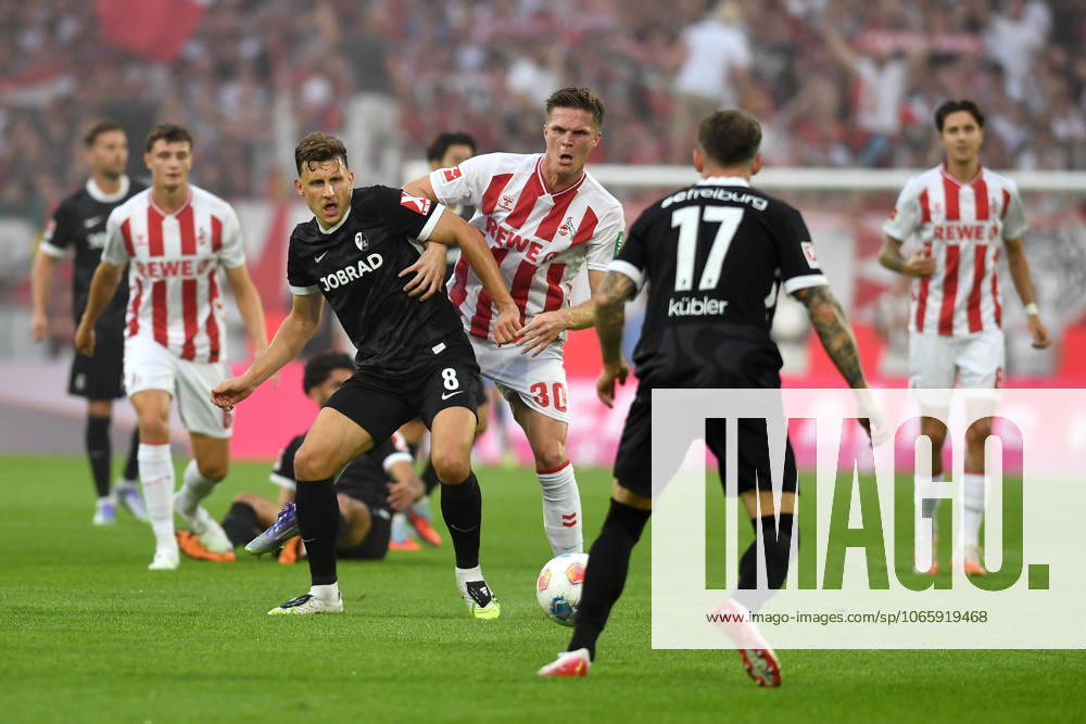 Maximilian Eggestein SC Freiburg and Marius Buelter 1 FC Koeln battle for the ball during the Bundesliga match between 1 FC Köln and SC Freiburg at Rhein Energie Stadion on August 31, 2025 in Cologne, Germany, Germany Photo by Ralf Treese DeFodi Images Maximilian Eggestein SC Freiburg and Marius Buelter 1 FC Koeln battle for the ball during the Bundesliga match between 1 FC Köln and SC Freiburg at Rhein Energie Stadion on August 31, 2025 in Köln, Germany Photo by Ralf Treese DeFodi Images DFL regulations prohibit any use of photographs as image sequences and or quasi video Photo by Ralf Treese DeFodi Images