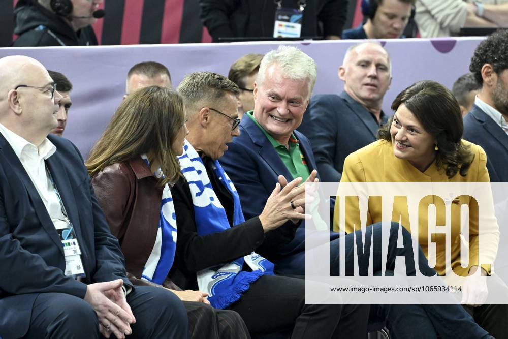 Finland s President Alexander Stubb (C) and his wife Suzanne Innes-Stubb (2nd L) chat with Lithuania s President Gitanas Nauseda and his wife Diana Nausediene (R) before the basketball FIBA EuroBasket 2025 group B match between Finland and Lithuania in Tampere, Finland, on September 1, 2025. Tampere Finland LKFTJK20250901203335FPPU