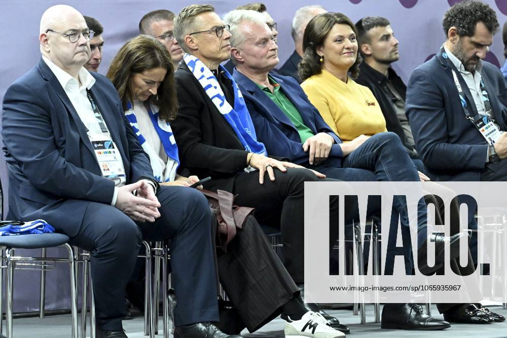Finland s President Alexander Stubb (C) and his wife Suzanne Innes-Stubb (2nd L) watch the game with Lithuania s President Gitanas Nauseda and his wife Diana Nausediene during the basketball FIBA EuroBasket 2025 group B match between Finland and Lithuania in Tampere, Finland, on September 1, 2025. Tampere Finland LKFTJK20250901212104FPDU