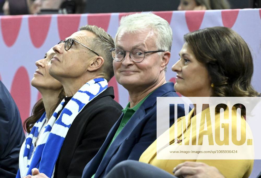 Finland s President Alexander Stubb and his wife Suzanne Innes-Stubb (L) watch the game with Lithuania s President Gitanas Nauseda and his wife Diana Nausediene during the basketball FIBA EuroBasket 2025 group B match between Finland and Lithuania in Tampere, Finland, on September 1, 2025. Tampere Finland LKFTJK20250901214513BTEP