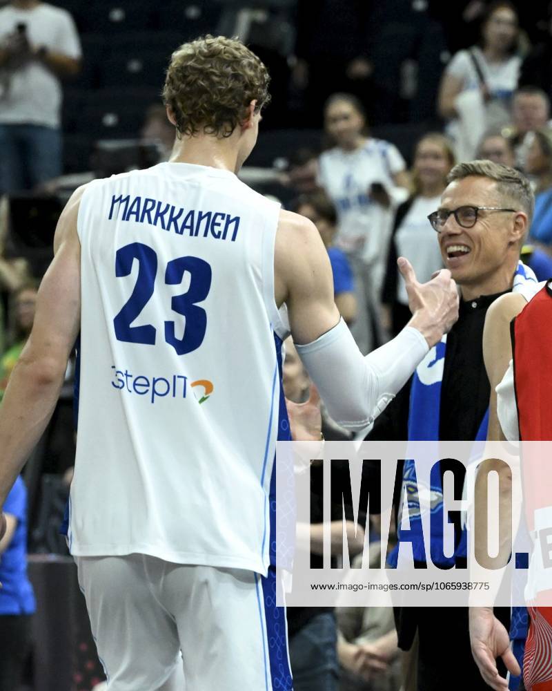 Finland s President Alexander Stubb talks with Lauri Markkanen after the basketball FIBA EuroBasket 2025 group B match between Finland and Lithuania in Tampere, Finland, on September 1, 2025. Tampere Finland LKFTJK20250901223945ABBX