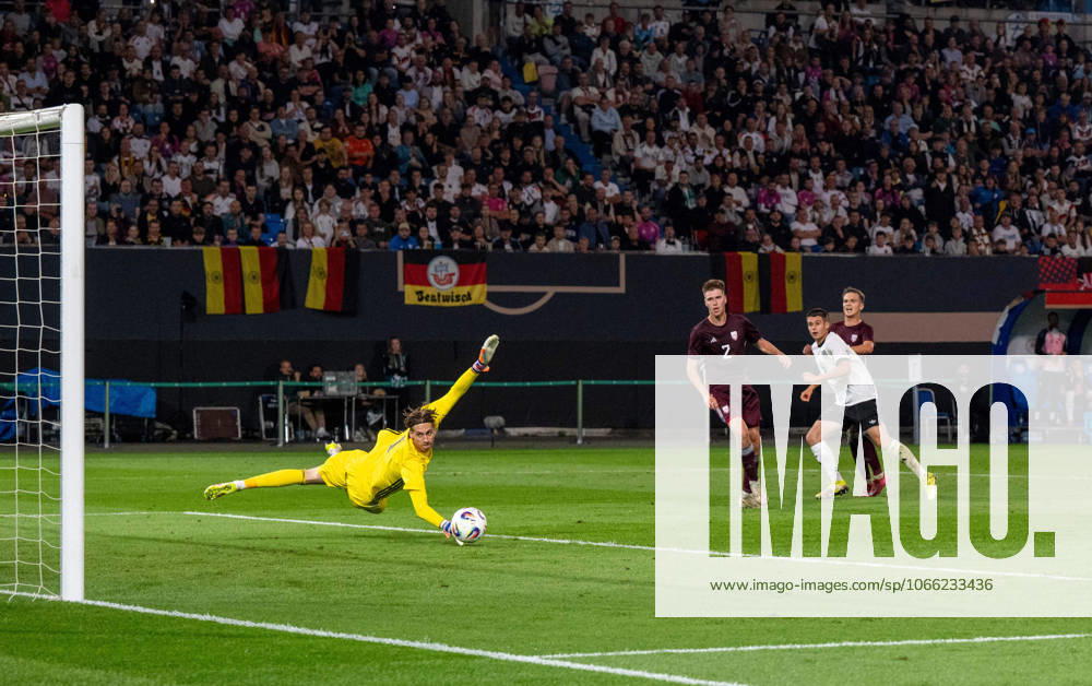 Soccer, Youth, Season 2025 26, U21, European Championship Qualification Group F 3 Matchday in Rostock, Germany Latvia, f l Nicolo Tresoldi U21, Germany scores the goal for 3 0 against goalkeeper Nikita Parfjonovs, 09 09 2025,