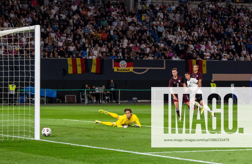 Soccer, Youth, Season 2025 26, U21, European Championship Qualification Group F 3 Matchday in Rostock, Germany Latvia, Nicolo Tresoldi 2 v r , U21, Germany scores the goal for 3 0 against goalkeeper Nikita Parfjonovs, 09 09 2025,