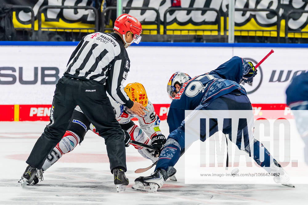 Linesperson David Tschirner executes a faceoff between Alexander Friesen Fischtown Pinguins Bremerhaven, 57 and Gabriel Fontaine EHC Red Bull Muenchen, 97 GER, EHC Red Bull Muenchen vs Fischtown Pinguins Bremerhaven, Ice Hockey, DEL, Matchday 2, Season 2025 2026, 14 09 2025 GER, EHC Red Bull Muenchen vs Fischtown Pinguins Bremerhaven, Ice Hockey, DEL, Matchday 2, Season 2025 2026, 14 09 2025 Muenchen