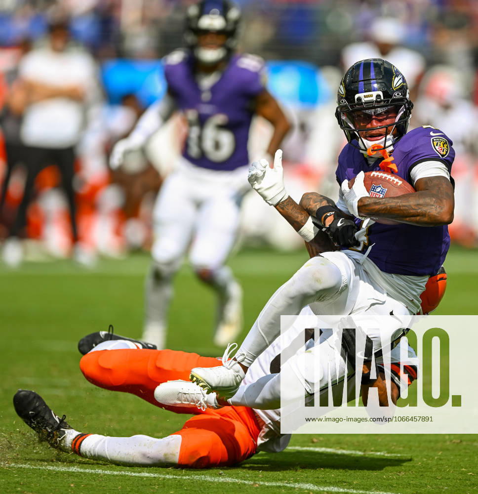 Baltimore Ravens wide receiver Zay Flowers (4) earns a first down after a catch over Cleveland Browns cornerback Greg Newsome II (0) during the fourth quarter of the Ravens home opener at M&T Bank Stadium in Baltimore, Maryland, on Sunday, September 14, 2025. BAL20250914140 DAVIDxTULIS