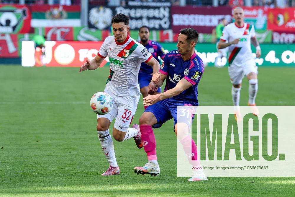 In duel, action, with Fabian Rieder 32 FC Augsburg , Dominik Kohr 31 1 FSV Mainz 05 , FC Augsburg vs 1 FSV Mainz 05, Soccer, 1 Bundesliga, 4 Matchday, 20 09 2025 DFB regulations prohibit any use of photographs as image sequences and or quasi video Augsburg Bayern Germany