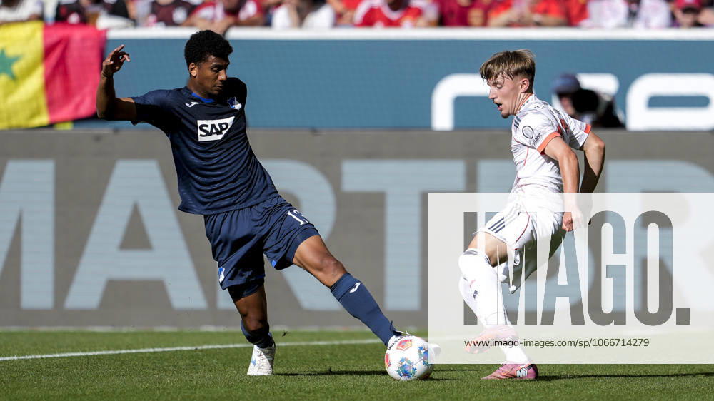 V li Bernardo Fernandes da Silva Junior Hoffenheim, 13 , Lennart Karl FC Bayern, 42 , duel, duel, tackle, tackling, dynamics, action, 20 09 2025, Sinsheim Germany , Football, Bundesliga, TSG 1899 Hoffenheim FC Bayern München, DFB DFL REGULATIONS PROHIBIT ANY USE OF PHOTOGRAPHS AS IMAGE SEQUENCES AND OR QUASI VIDEO