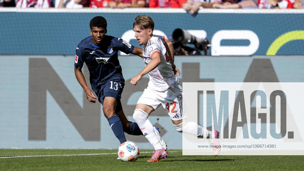 V li Bernardo Fernandes da Silva Junior Hoffenheim, 13 , Lennart Karl FC Bayern, 42 , duel, duel, tackle, tackling, dynamics, action, 20 09 2025, Sinsheim Germany , Football, Bundesliga, TSG 1899 Hoffenheim FC Bayern München, DFB DFL REGULATIONS PROHIBIT ANY USE OF PHOTOGRAPHS AS IMAGE SEQUENCES AND OR QUASI VIDEO
