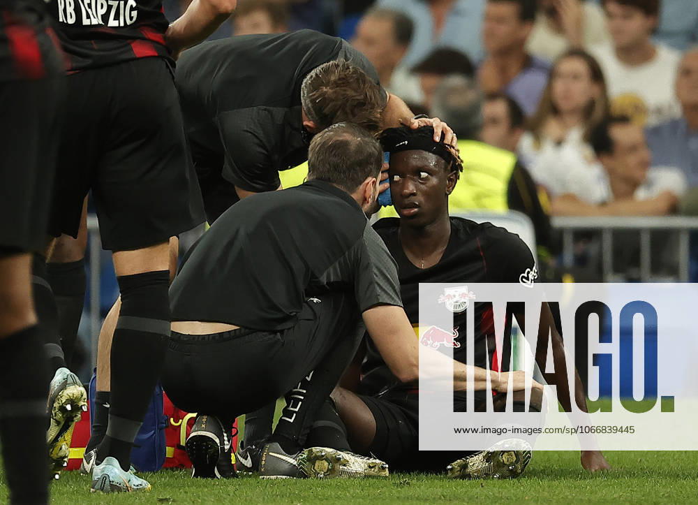 Real Madrid v RB Leipzig - UEFA Champions League MADRID, SPAIN - SEPTEMBER 14: Amadou Haidara of RB Leipzig gets injured during the UEFA Champions League Group F soccer match between Real Madrid and RB Leipzig at Santiago Bernabeu Stadium in Madrid, Spain on September 14, 2022. Madrid Spain. Editorial use only. Please get in touch for any other usage.
