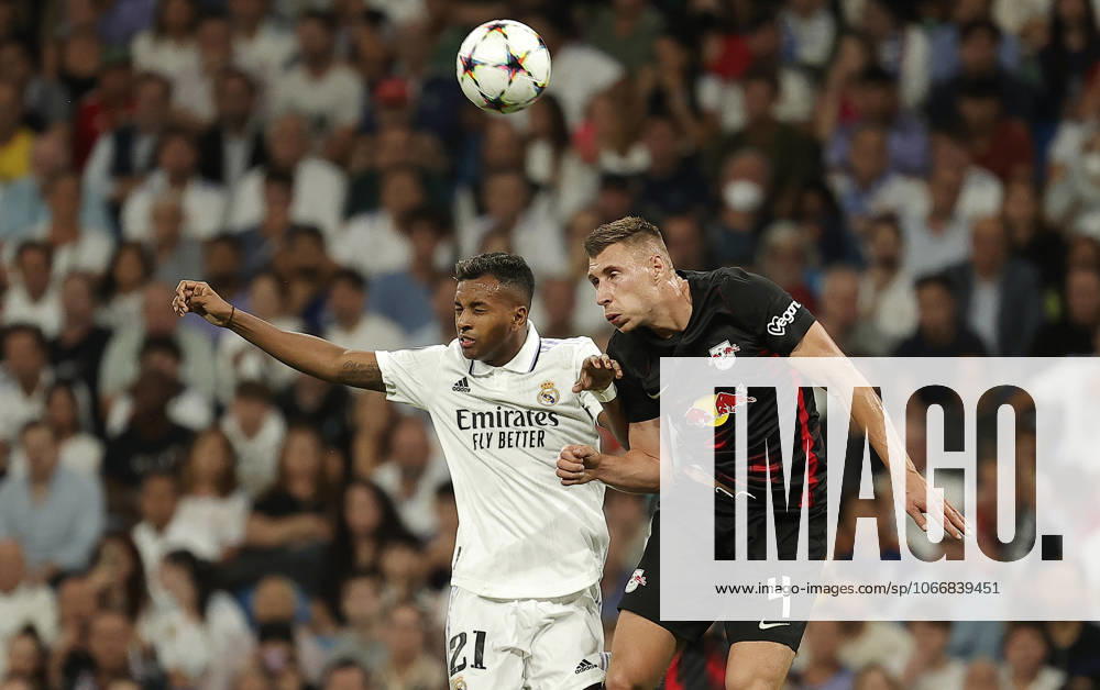 Real Madrid v RB Leipzig - UEFA Champions League MADRID, SPAIN - SEPTEMBER 14: Rodrygo (L) of Real Madrid in action against Willi Orban (R) of RB Leipzig during the UEFA Champions League Group F soccer match between Real Madrid and RB Leipzig at Santiago Bernabeu Stadium in Madrid, Spain on September 14, 2022. Madrid Spain. Editorial use only. Please get in touch for any other usage.