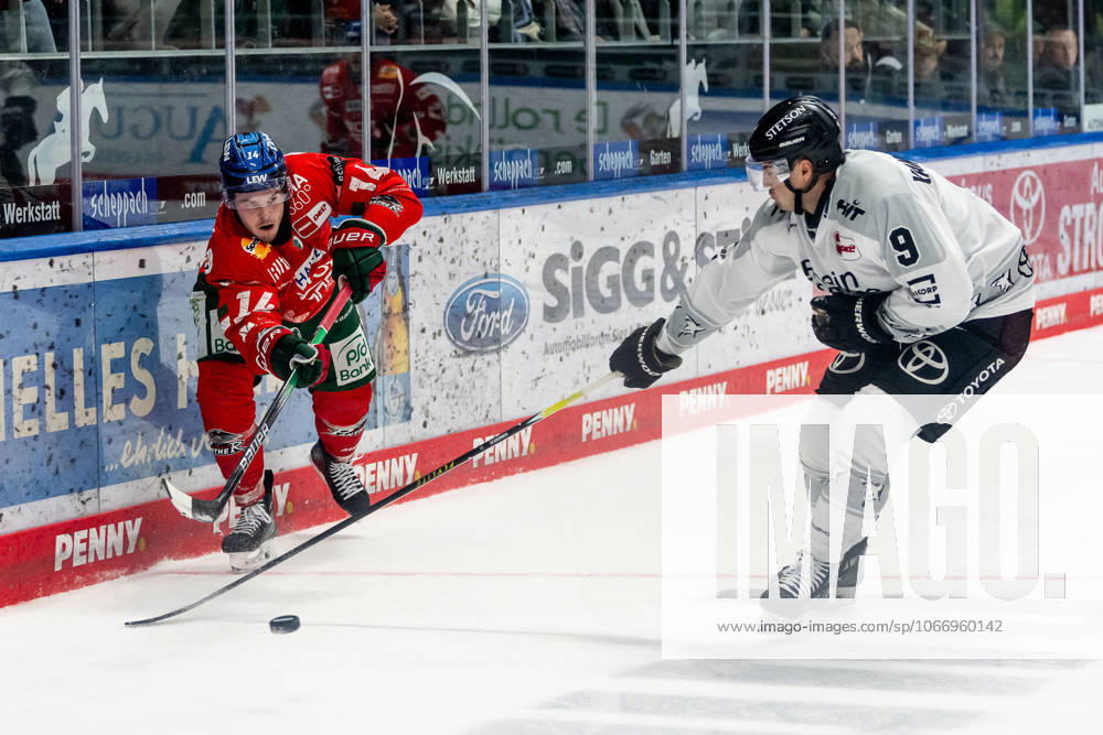 Fight for the puck duel between Donald D J Busdeker Augsburger Panther, 14 and Maximilian Kammerer Koelner Haie, 9 GER, Augsburger Panther vs Koelner Haie, Ice Hockey, DEL, Matchday 5, Season 2025 2026, 26 09 2025 GER, Augsburger Panther vs Koelner Haie, Ice Hockey, DEL, Matchday 5, Season 2025 2026, 26 09 2025 Augsburg