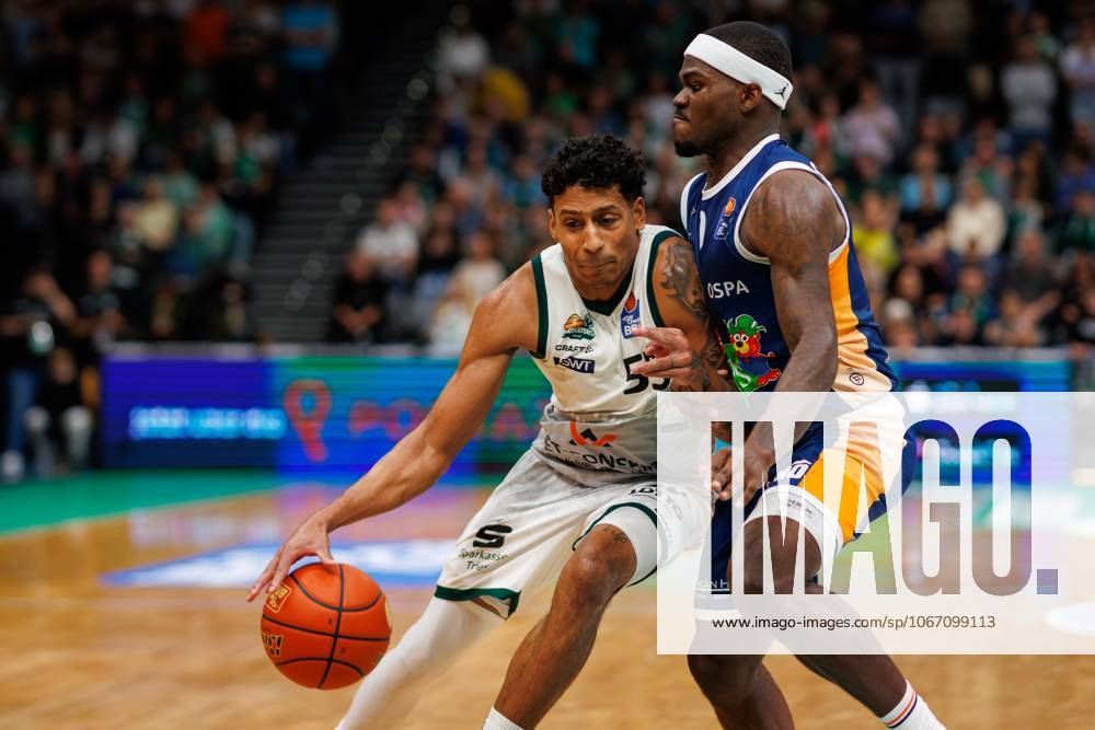 Eli Brooks Gladiators Trier in a duel with TJ Crockett Rostock Seawolves , Vet Concept Gladiators Trier vs Rostock Seawolves, Basketball, easyCredit BBL, 1 Spieltag, Saison 2025 2026, 28 09 2025 DFB regulations prohibit any use of photographs as image sequences and or quasi video Vet Concept Gladiators Trier vs Rostock Seawolves, Basketball, easyCredit BBL, 1 Spieltag, Saison 2025 2026