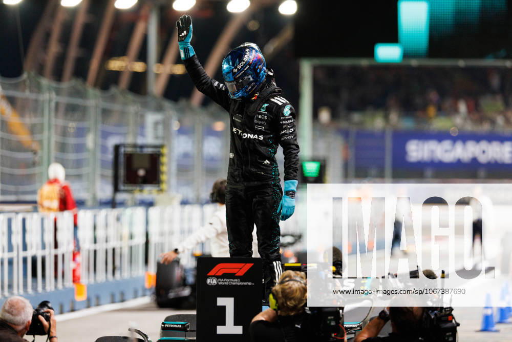 George Russell of Great Britain and the Mercedes-AMG PETRONAS Formula One Team celebrates after securing pole position ahead of the F1 Grand Prix of Singapore at the Marina Bay Street Circuit. Singapore Singapore - ZUMAs197 20251004_aaa_s197_340