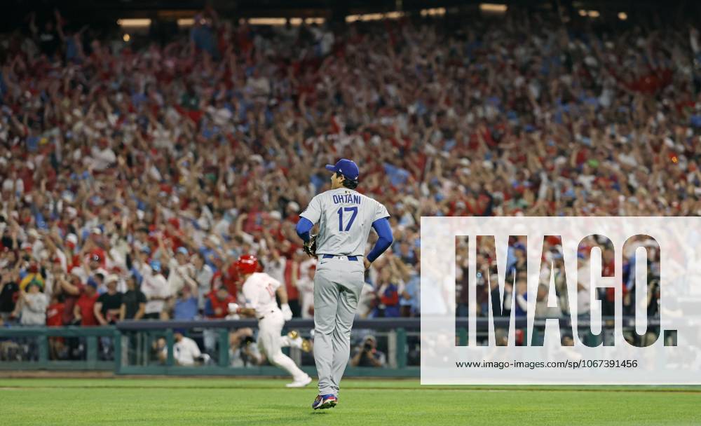 Baseball: Division Series between Dodgers and Phillies Los Angeles Dodgers two-way player Shohei Ohtani (front) is pictured after giving up a two-run triple to J.T. Realmute (back) of the Philadelphia Phillies in the second inning of Game 1 of the Division Series at Citizens Bank Park in Philadelphia on Oct. 4, 2025. A14AA0004911445P