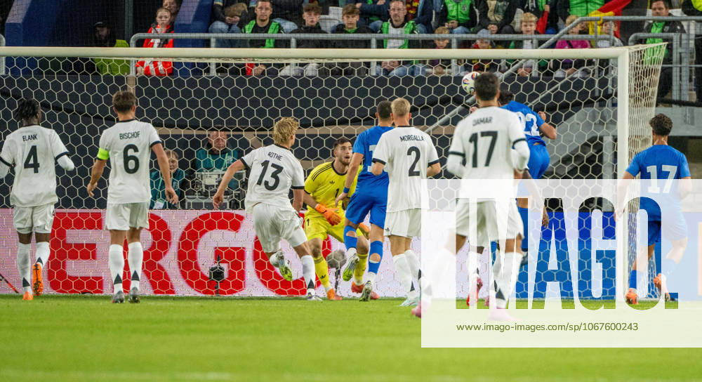 Soccer, Youth, Season 2025 26, U21, European Championship Qualification Group F 4 Matchday in Jena Germany Greece, Konstantinos Kostoulas 2 v r , U21, Greece , scores the goal to 0 1 against goalkeeper Dennis Seimen U21, Germany , 10 10 2025,