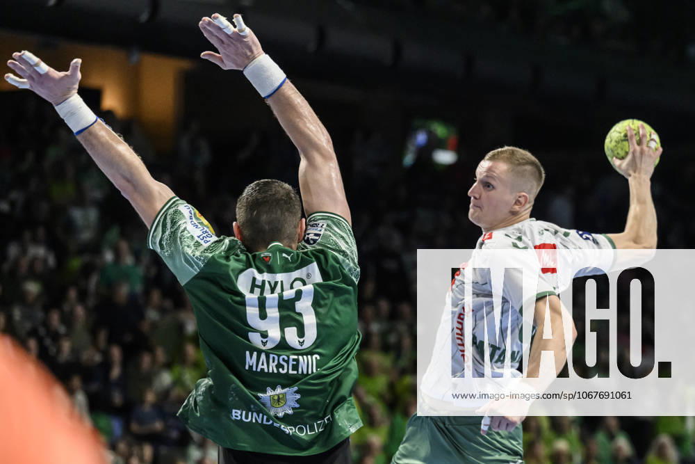 In the picture from l Mijajlo Marsenic Fuechse Berlin , Karolis Antanavicius GWD Minden , duel, action, fight, fights for the ball, GER, Berlin, handball, Fuechse Berlin vs GWD Minden , DAIKIN Handball Bundesliga, in the Max Schmeling Halle, 12 10 2025,