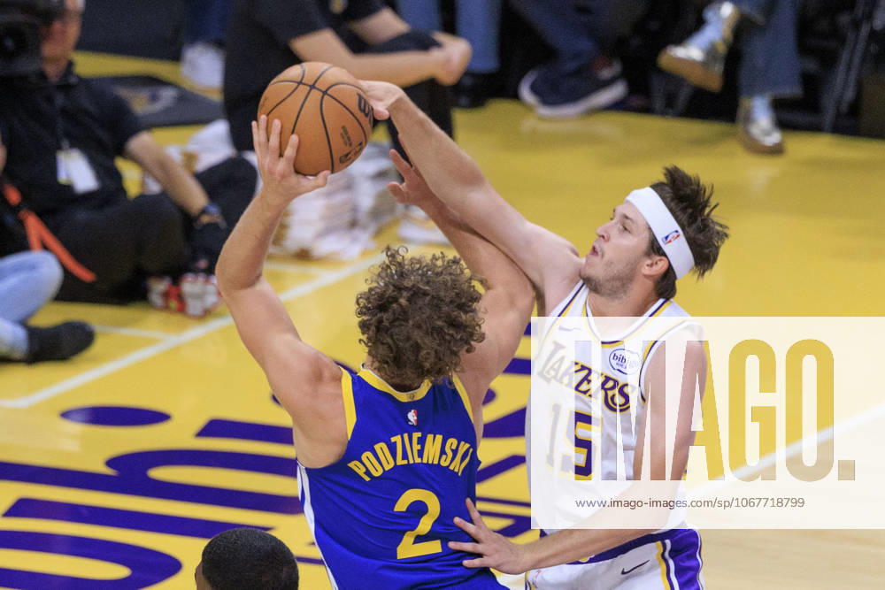 Austin Reaves 15 of the Los Angeles Lakers blocks a shot by Brandin Podziemski 2 of the Golden State Warriors during their preseason NBA, Basketball Herren, USA game on Sunday October 12, 2025 at Crypto.com Arena in Los Angeles, California. Lakers defeat Warriors, 126-116. JAVIER ROJAS PI Los Angeles USA - ZUMAp124 20251012_zaa_p124_066