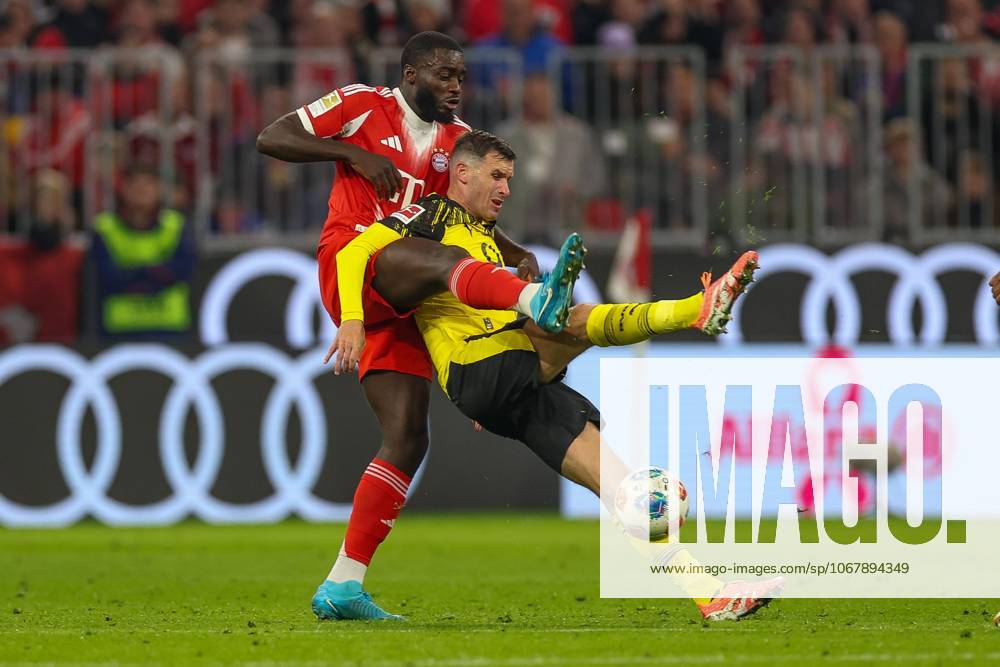 In duel, action, with Dayot Upamecano 2 FC Bayern Muenchen , Pascal Gross 13 Borussia Dortmund , FC Bayern Muenchen vs Borussia Dortmund, Football, 1 Bundesliga, 7 Matchday, 18 10 2025 DFB regulations prohibit any use of photographs as image sequences and or quasi video Muenchen Bayern Germany
